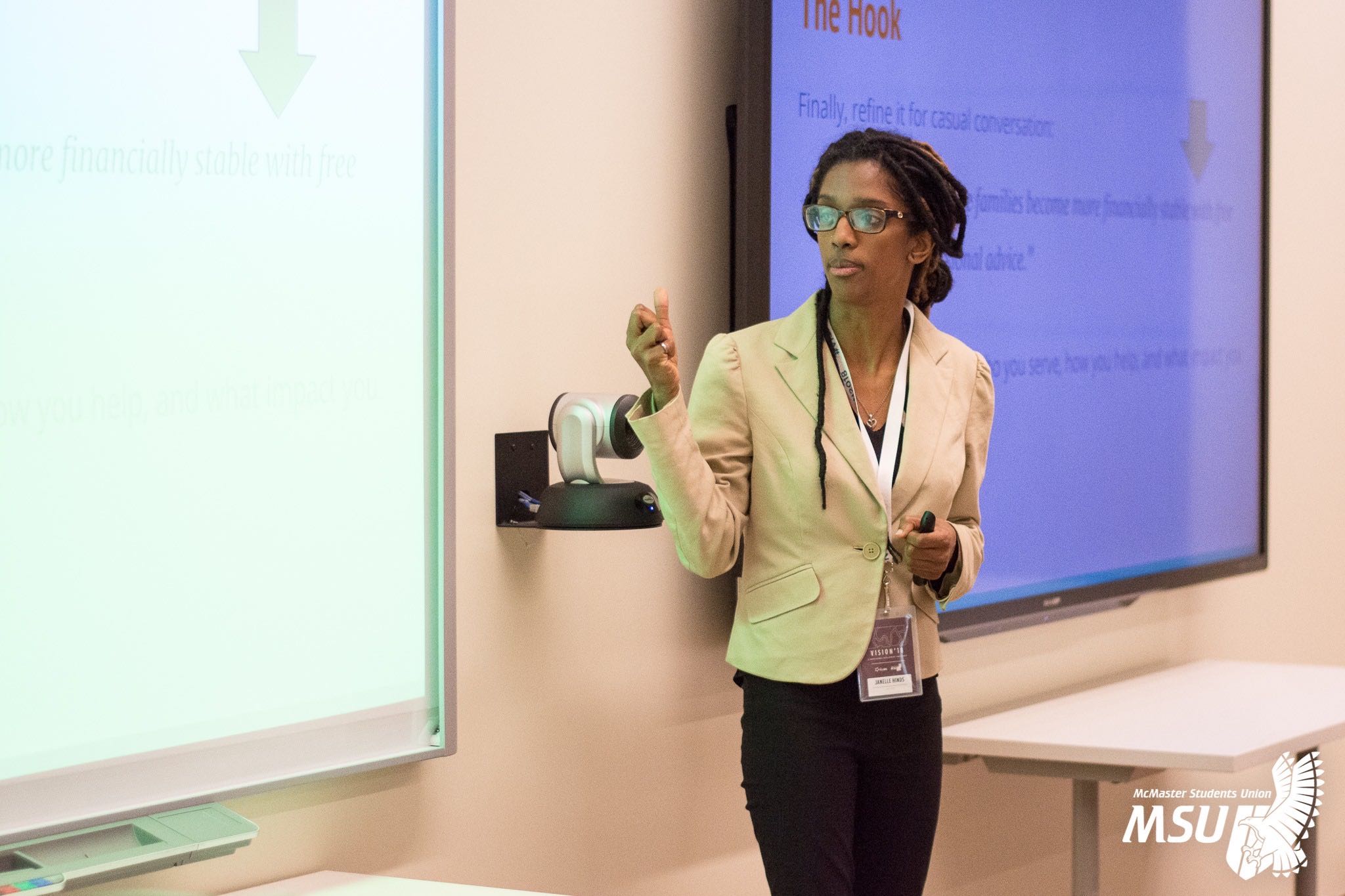 Janelle Hinds presentating to an audience