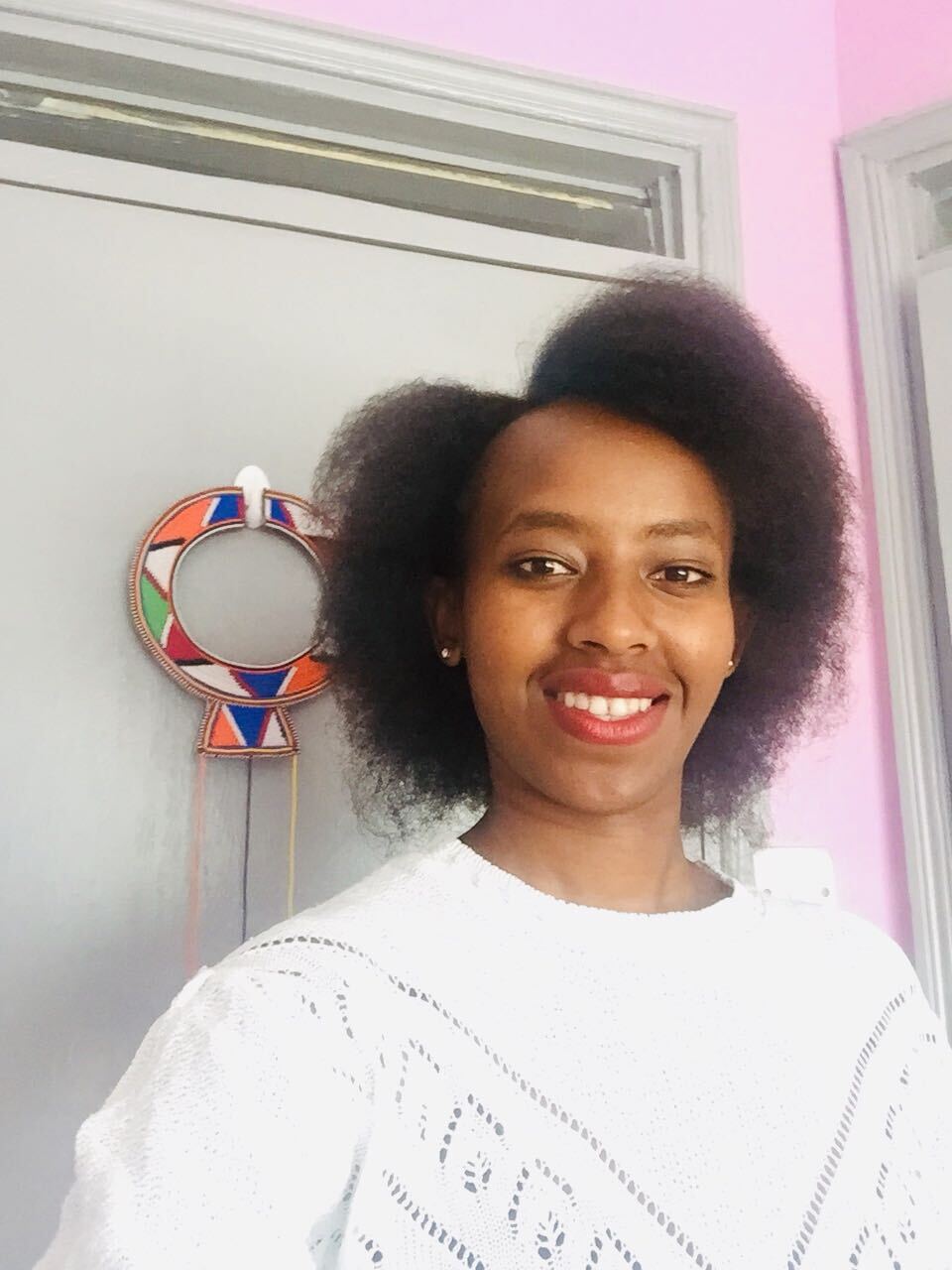Headshot of Esther Mugabo