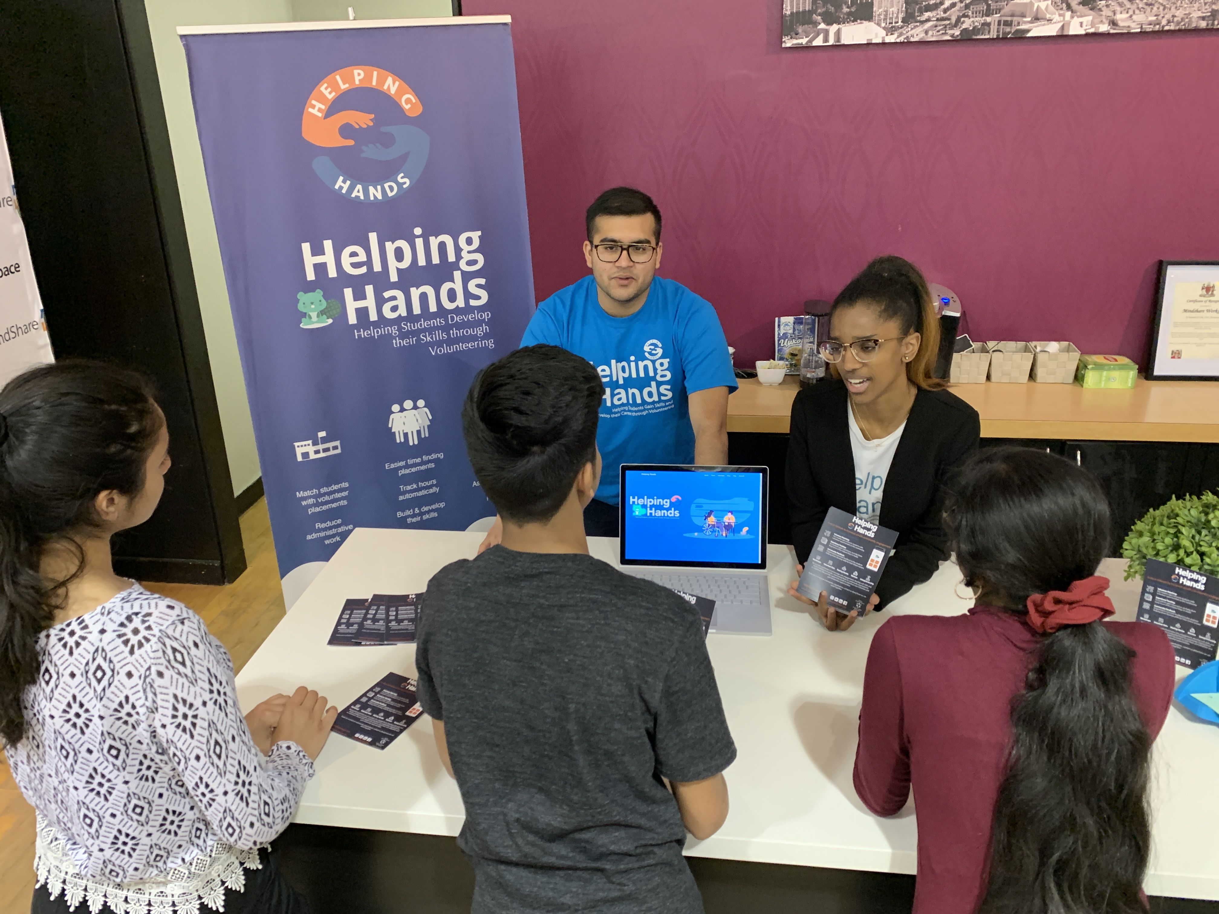 Volunteer Fair Booth with Students